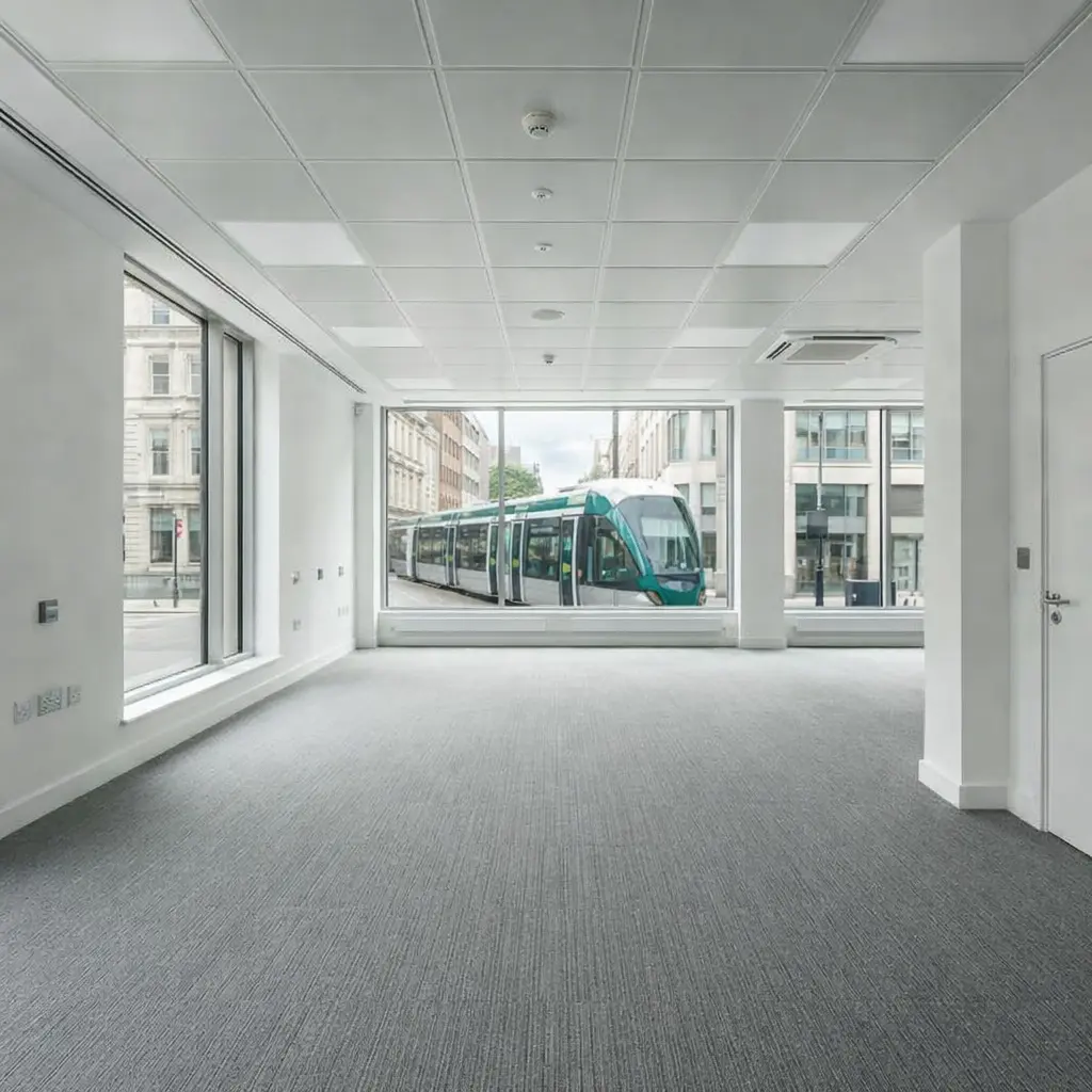 Empty cleared office with Nottingham tram in background